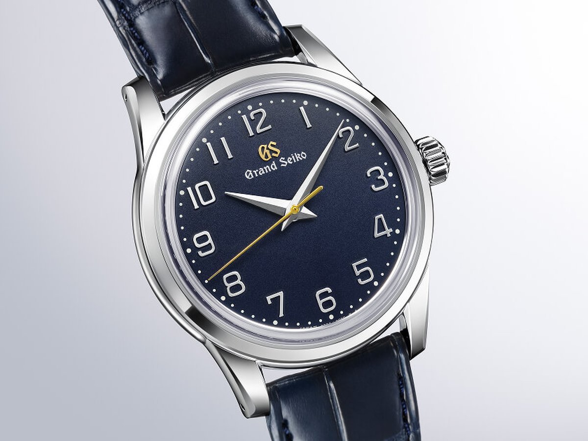 Grand Seiko SBGW325 angled official photo of indigo Arabic dial and hon-ai crocodile strap